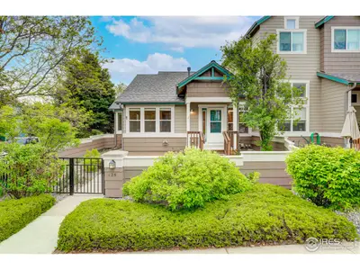 LIGHT BRIGHT END UNIT with MAIN-LEVEL PRIMARY BEDROOM in a LUSH, TREE-LINED neig…
