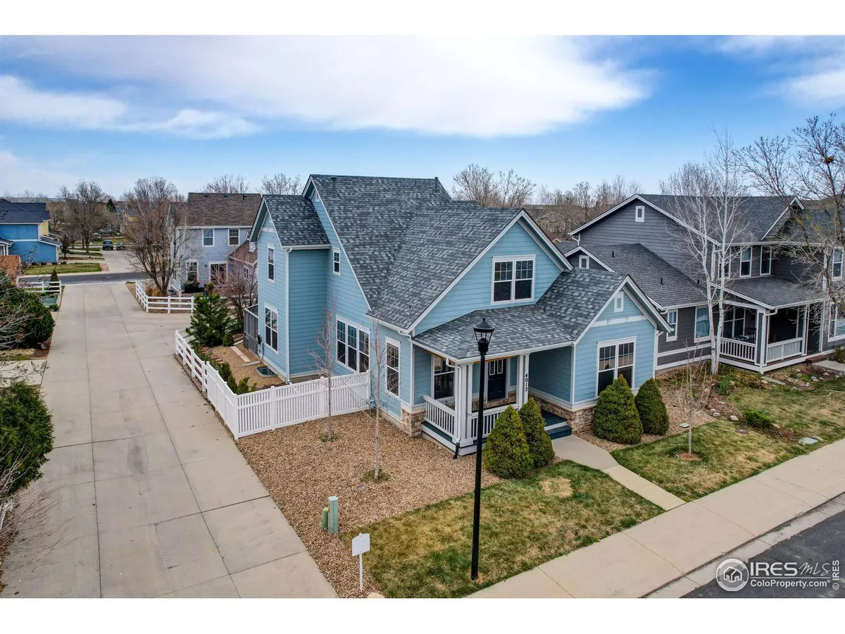 Welcome to this large, corner lot home in Renaissance, a QUIET Longmont neighbor…