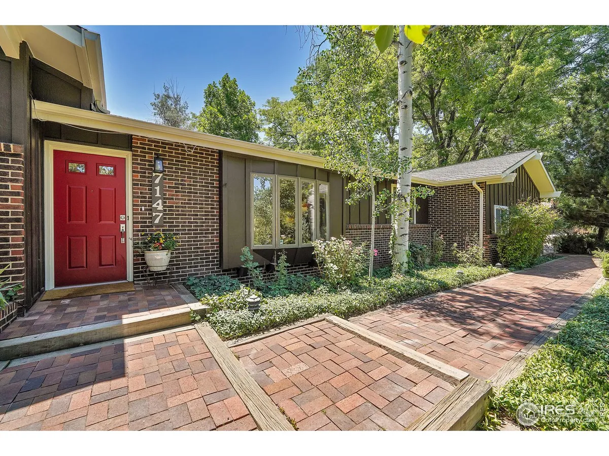 Nestled on .4 acres of privacy, this inviting 5-bedroom residence exudes timeles…