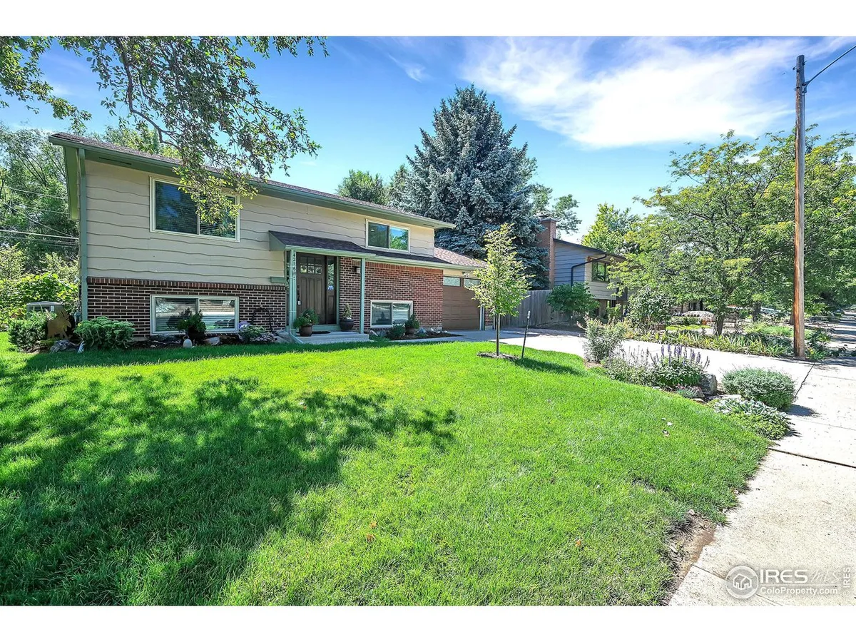 Completely remodeled bi-level charmer backing to Bear Canyon Creek, greenbelt an…