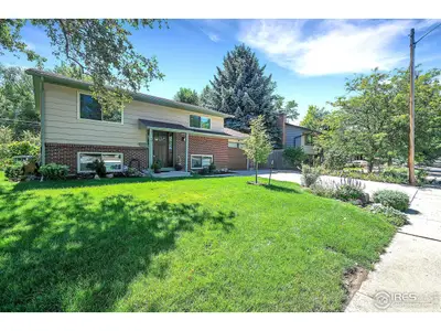 Completely remodeled bi-level charmer backing to Bear Canyon Creek, greenbelt an…